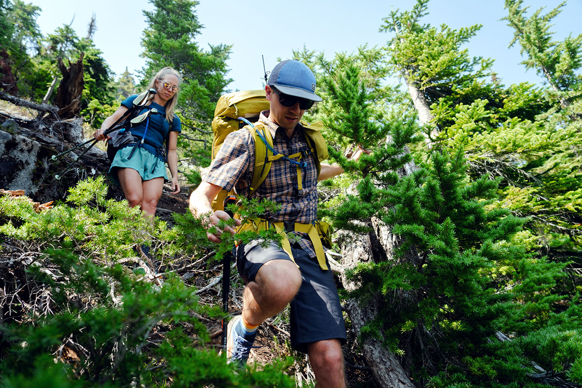 ​​REI Co-op Flash 55 backpack (hiking down steep slope)